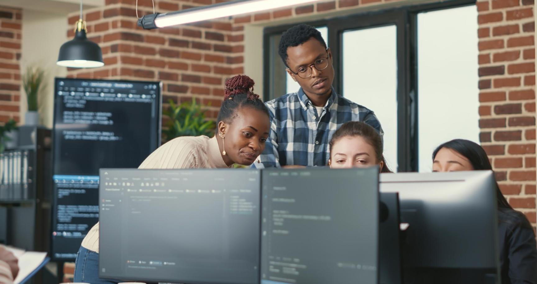 Professional developers collaborating on version control workflows